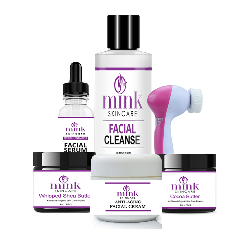 Mrs. Riley Anti-Aging Facial Kit with cleanser bottle, serum bottle, skincare jars, facial brush, and black soap box.