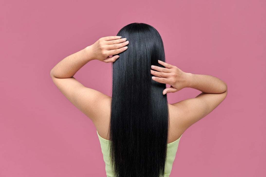 A person with long healthy hair.