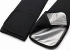 Black arm sleeve pair with reflective inner lining.